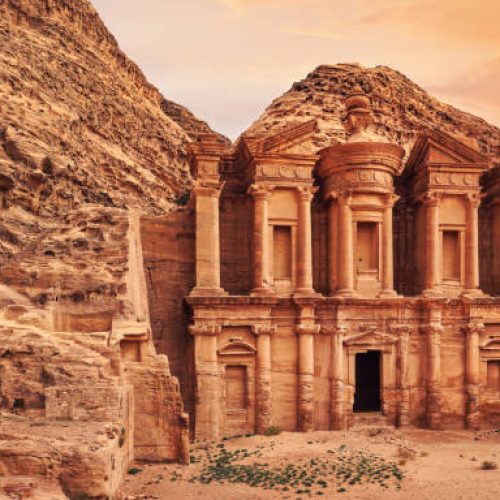 Ad Deir - Monastery - ruins carved in rocky wall at Petra Jordan.