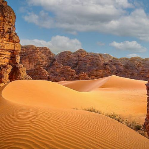 Sand dunes in rocks in the Sahara desert