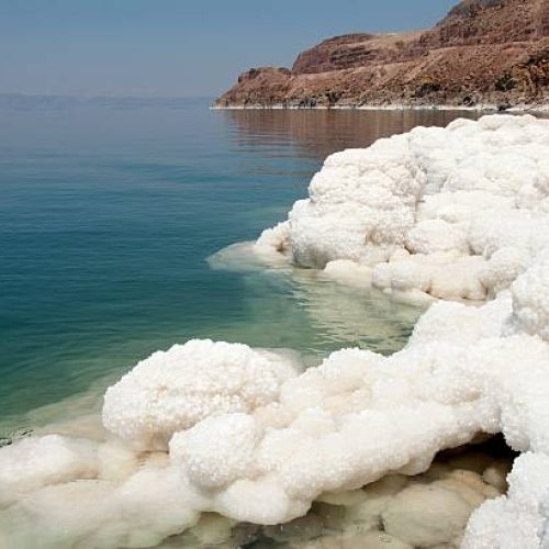 Salted Water in the Dead Sea with salt crystals (Jordan)